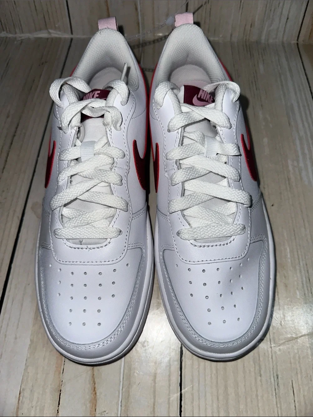 Nike White Sneakers with Maroon Swoosh and Pink Heel Tab